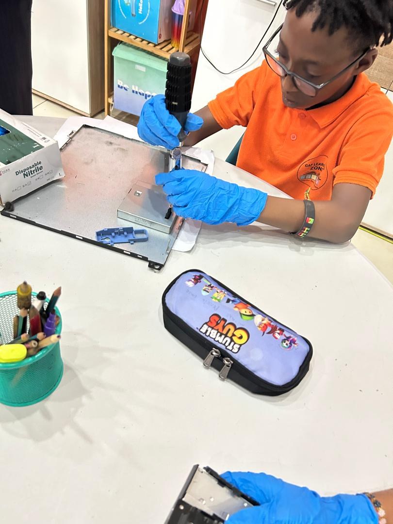 Student taking part in a STEM technology activity
